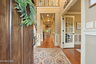 Perched on a hill within the prestigious gated community of - photo 3