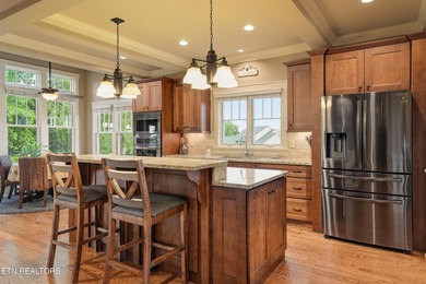 Perched on a hill within the prestigious gated community of - photo 4