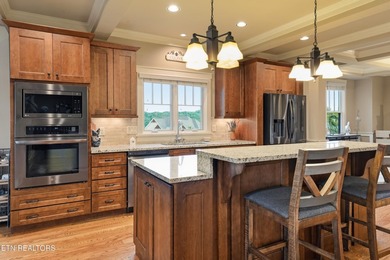 Perched on a hill within the prestigious gated community of - photo 5