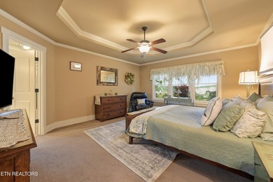 Perched on a hill within the prestigious gated community of - photo 10