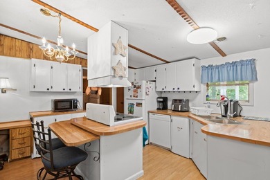 Welcome to this charming 3-bedroom, 2-bath home located in the - photo 13
