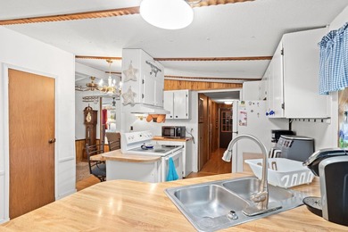 Welcome to this charming 3-bedroom, 2-bath home located in the - photo 15