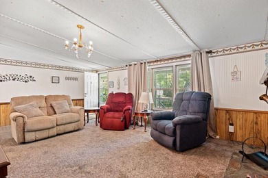 Welcome to this charming 3-bedroom, 2-bath home located in the - photo 18