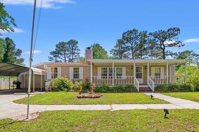 Welcome to this charming 3-bedroom, 2-bath home located in the - photo 30