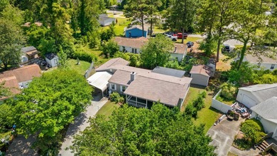 Welcome to this charming 3-bedroom, 2-bath home located in the - photo 31