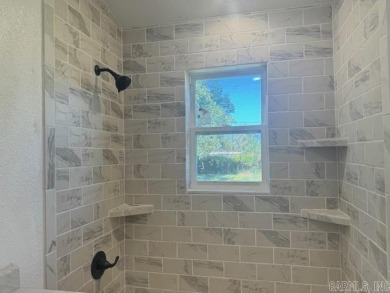 New from the floors up!! This 3-bedroom, 1 bathroom fully