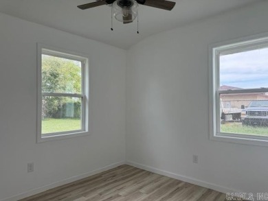 New from the floors up!! This 3-bedroom, 1 bathroom fully