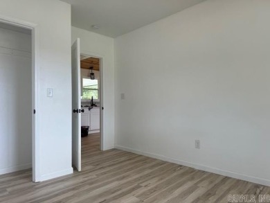 New from the floors up!! This 3-bedroom, 1 bathroom fully