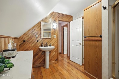 First time on the market, this cozy waterfront cabin graces the - photo 16