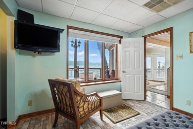 First time on the market, this cozy waterfront cabin graces the - photo 25