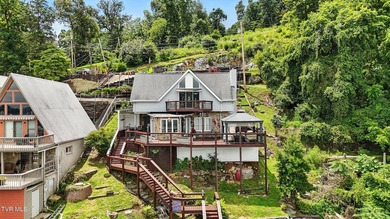 First time on the market, this cozy waterfront cabin graces the - photo 36