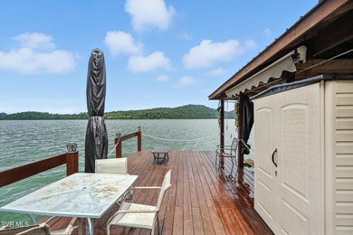 First time on the market, this cozy waterfront cabin graces the - photo 38