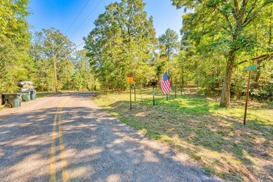 Nestled in a tranquil, 23 Acre wooded setting, this charming - photo 2