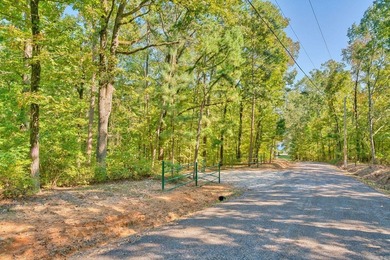 Nestled in a tranquil, 23 Acre wooded setting, this charming - photo 3