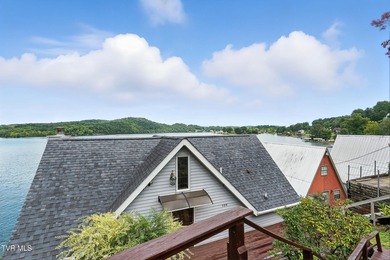 First time on the market, this cozy waterfront cabin graces the - photo 44