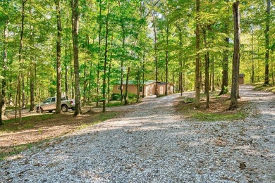 Nestled in a tranquil, 23 Acre wooded setting, this charming - photo 5