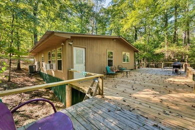 Nestled in a tranquil, 23 Acre wooded setting, this charming - photo 6