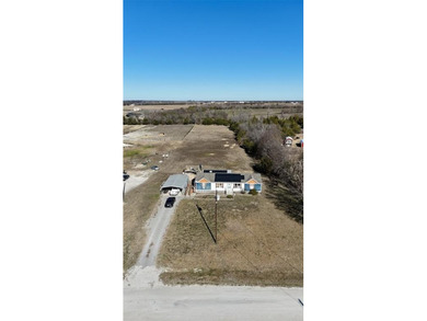 Discover country living with convenient access to town in this