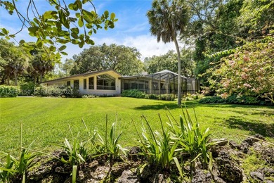 Set on approximately 1.75 acres within the gated community of - photo 8