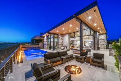 Experience elevated lakefront living in this exceptional Brady - photo 2