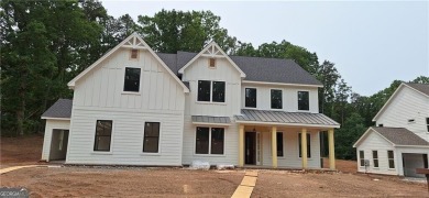 Lake Home For Sale in Cumming, Georgia