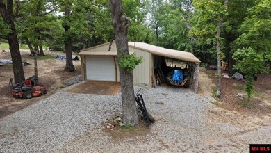 Tucked away in the beautiful Ozarks near Bull Shoals Lake, this - photo 14