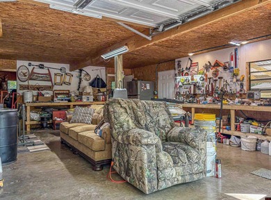 Tucked away in the beautiful Ozarks near Bull Shoals Lake, this - photo 17