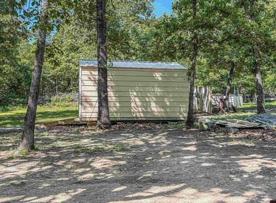 Tucked away in the beautiful Ozarks near Bull Shoals Lake, this - photo 18