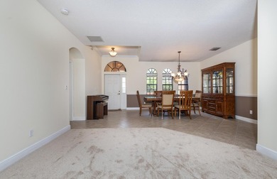 This meticulously maintained 4-bed 3-bath residence features a - photo 10