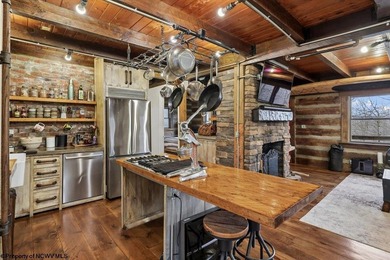 Tucked away on a serene 2-acre wooded lot in the highly - photo 12