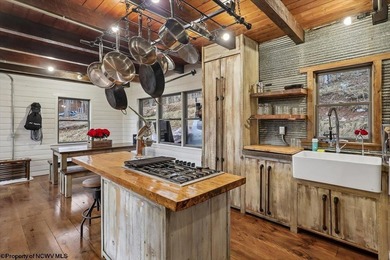 Tucked away on a serene 2-acre wooded lot in the highly - photo 13