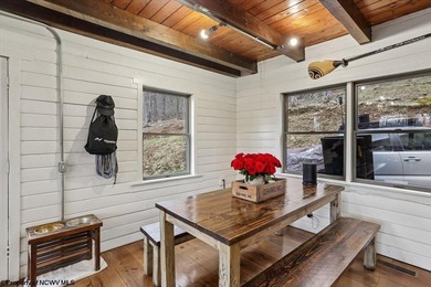 Tucked away on a serene 2-acre wooded lot in the highly - photo 14