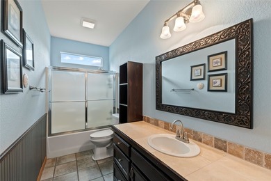 Tucked inside a sought-after gated community, this waterfront - photo 14