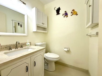 Welcome to this charming villa-style 1 bedroom, 1.5 bath condo - photo 15