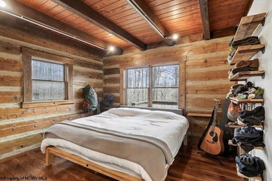 Tucked away on a serene 2-acre wooded lot in the highly - photo 16