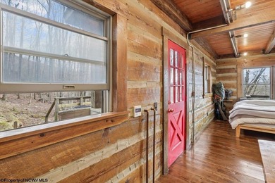 Tucked away on a serene 2-acre wooded lot in the highly - photo 18