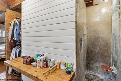 Tucked away on a serene 2-acre wooded lot in the highly - photo 20
