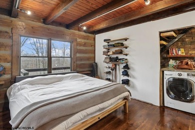 Tucked away on a serene 2-acre wooded lot in the highly - photo 21