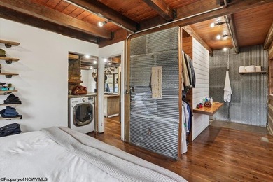 Tucked away on a serene 2-acre wooded lot in the highly - photo 22