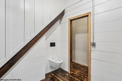 Tucked away on a serene 2-acre wooded lot in the highly - photo 24
