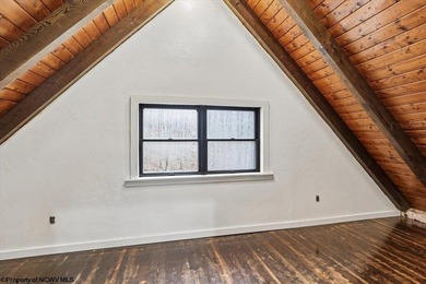 Tucked away on a serene 2-acre wooded lot in the highly - photo 28