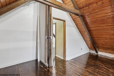 Tucked away on a serene 2-acre wooded lot in the highly - photo 29