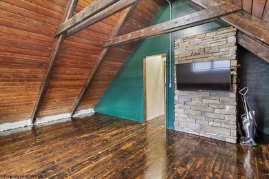 Tucked away on a serene 2-acre wooded lot in the highly - photo 31