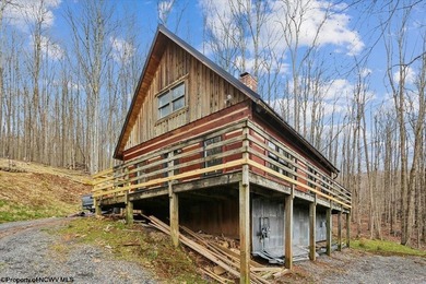 Tucked away on a serene 2-acre wooded lot in the highly - photo 33