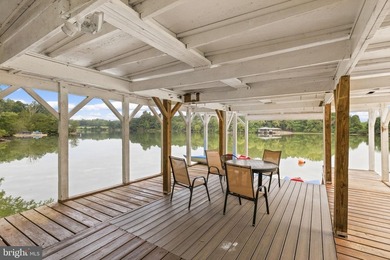 Set on 3.53 acres with 280 feet of deep water frontage on the - photo 10