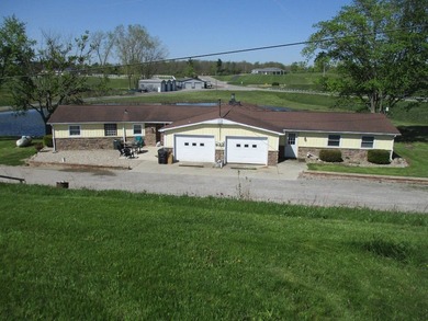 Beautiful Pond View Setting! This home features an additional - photo 1