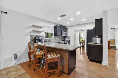 This charming home boasts hardwood floors throughout, granite - photo 14