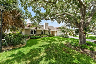 Nestled on an oversized, beautifully landscaped lot in the - photo 5