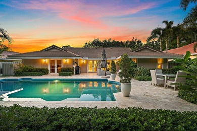 Nestled on an oversized, beautifully landscaped lot in the - photo 6