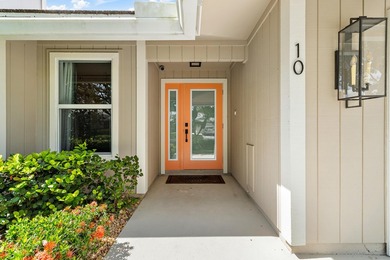Nestled on an oversized, beautifully landscaped lot in the - photo 9